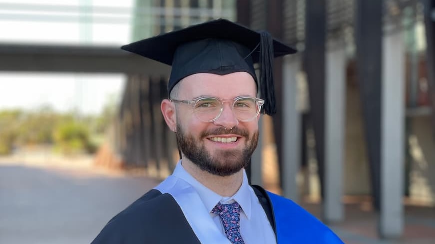 Young man in graduation dress