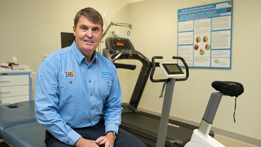 A man sitting on a medical examination table