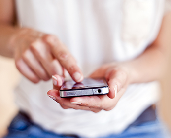 Image of someone using an iphone