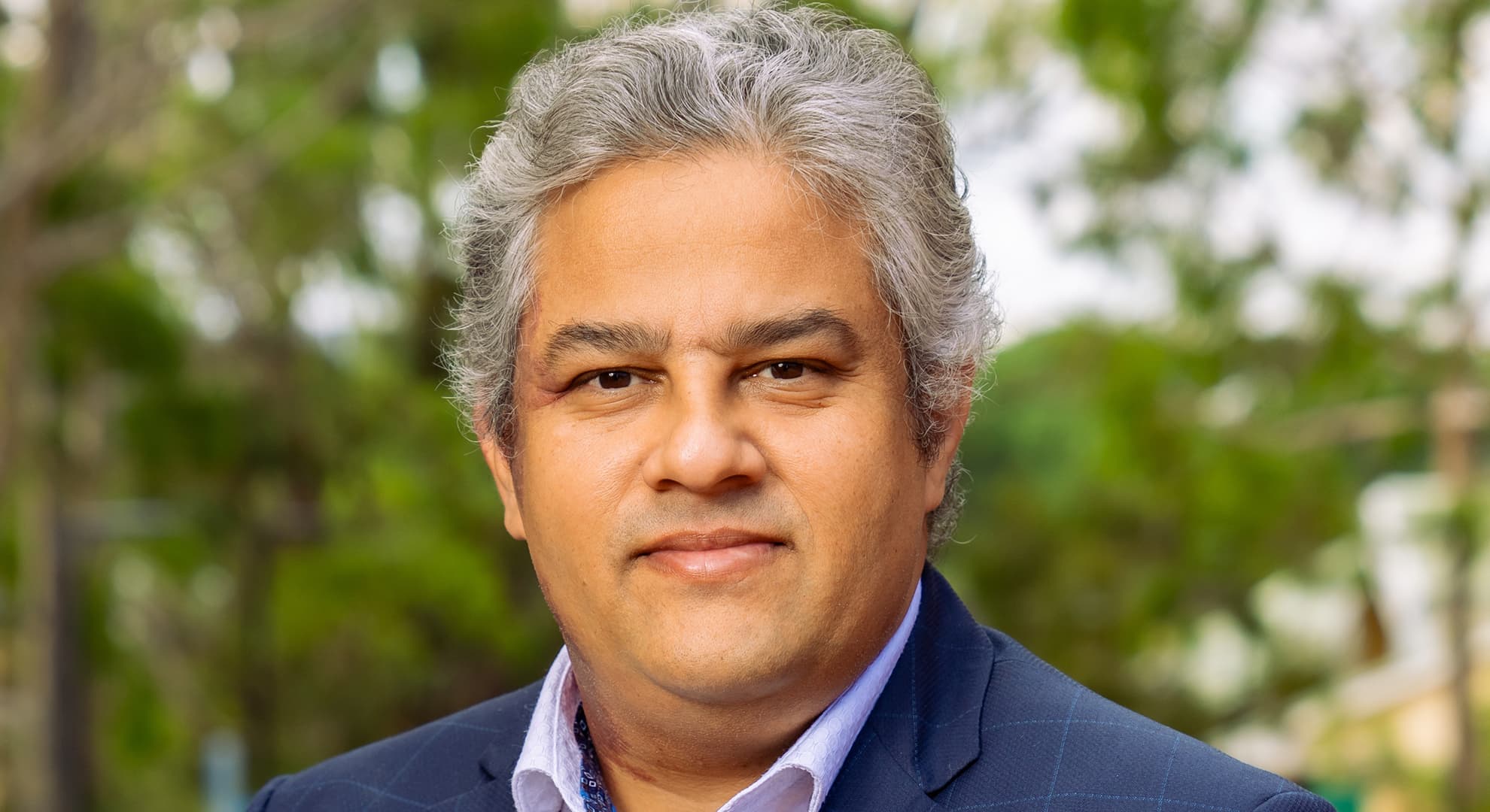 Head and shoulders picture of Dr Joshua Aston.