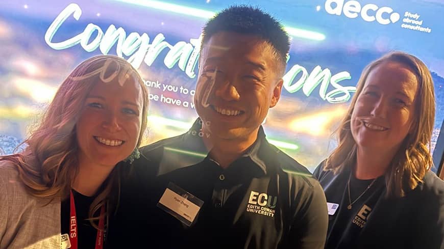 Three people facing the camera