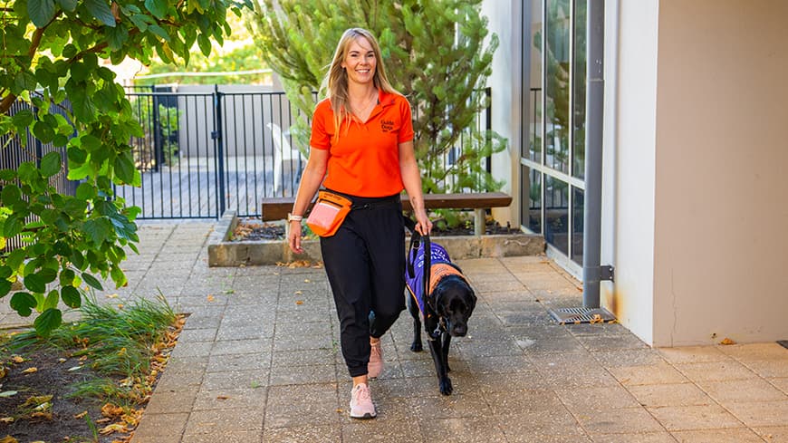 Guide Dogs WA Justice Facility Dog Handler Katie Crawford with Winston