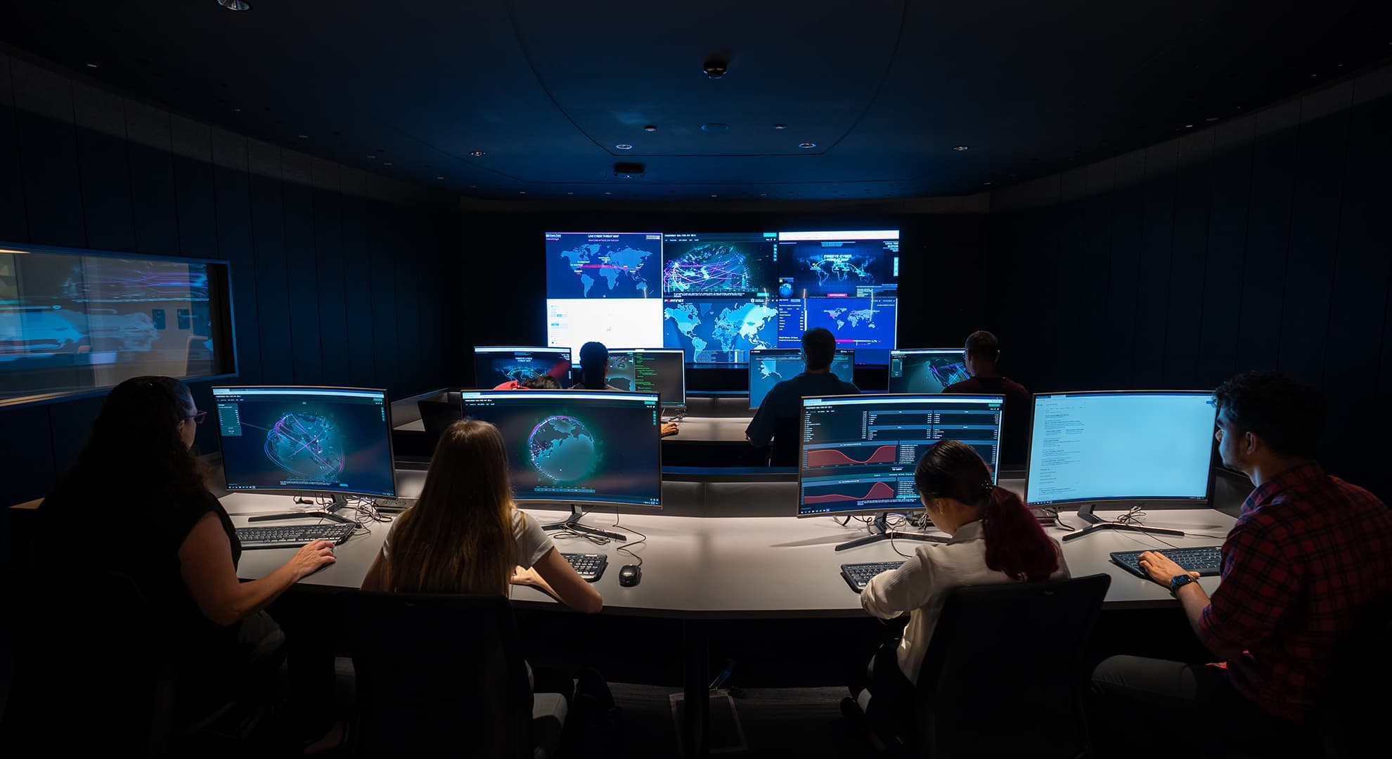 Students in a room watching computer screens