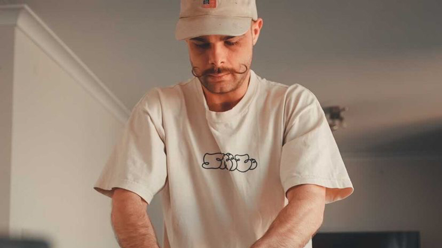 Isaac Huggins working on a screen printing project.