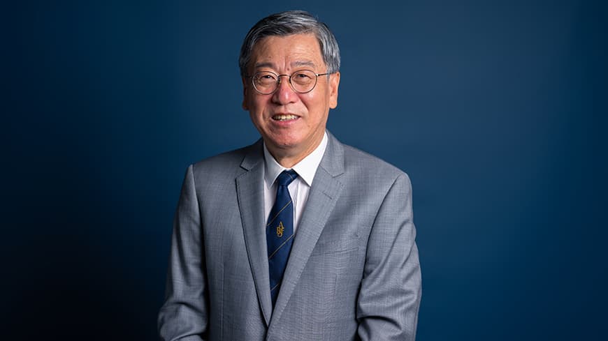 A man posing for a photograph