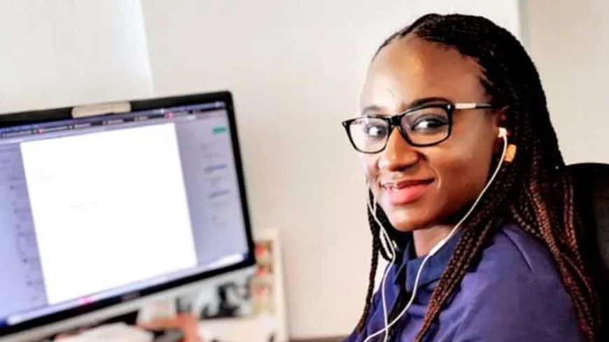Young woman at her computer