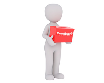A graphic depicts a plasticine-type figure holding a red post box with 'feedback' written on it.