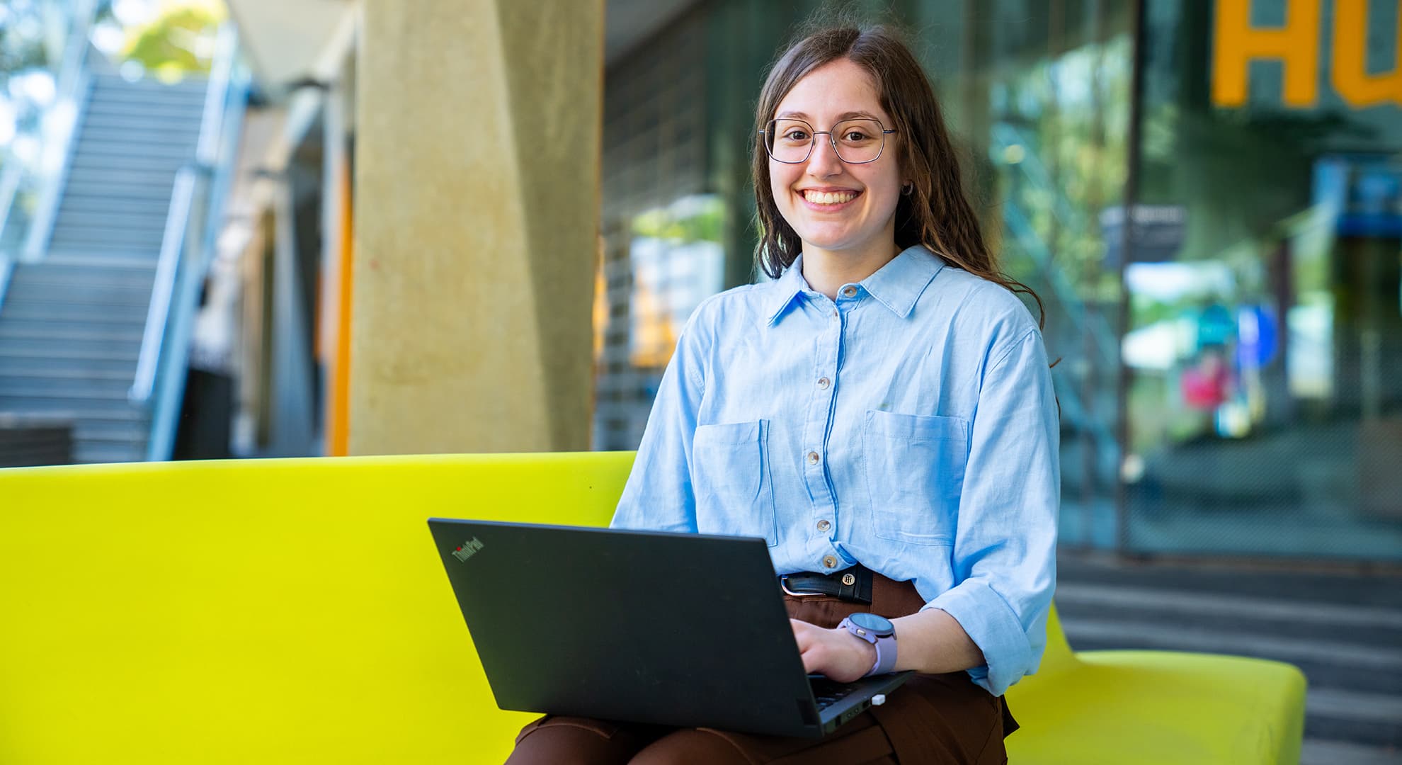 Young woman with laptop computer