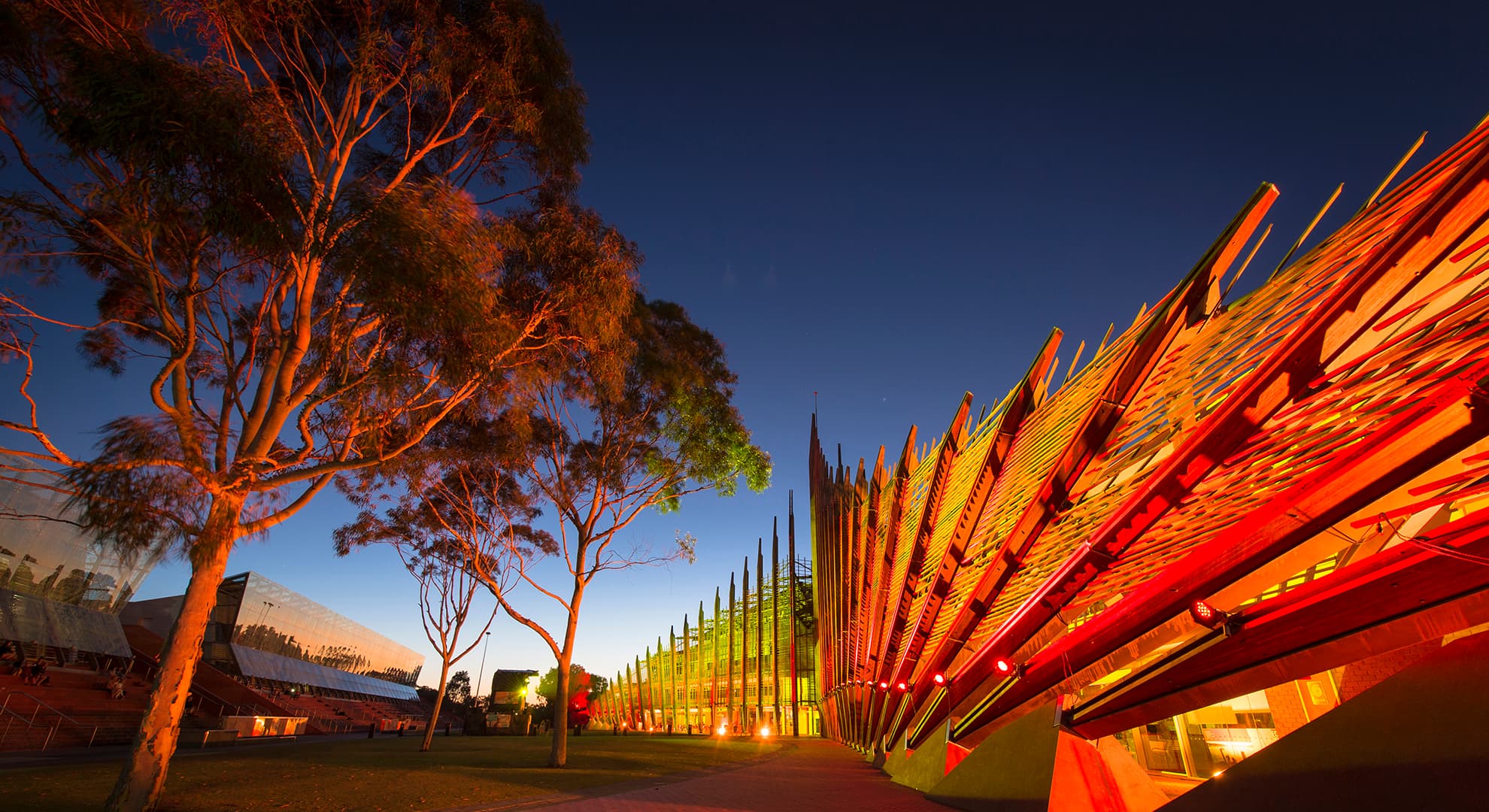Building lit up in orange light.