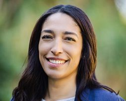 Professional portrait image of Ms Daniela Niv smiling at the camera.