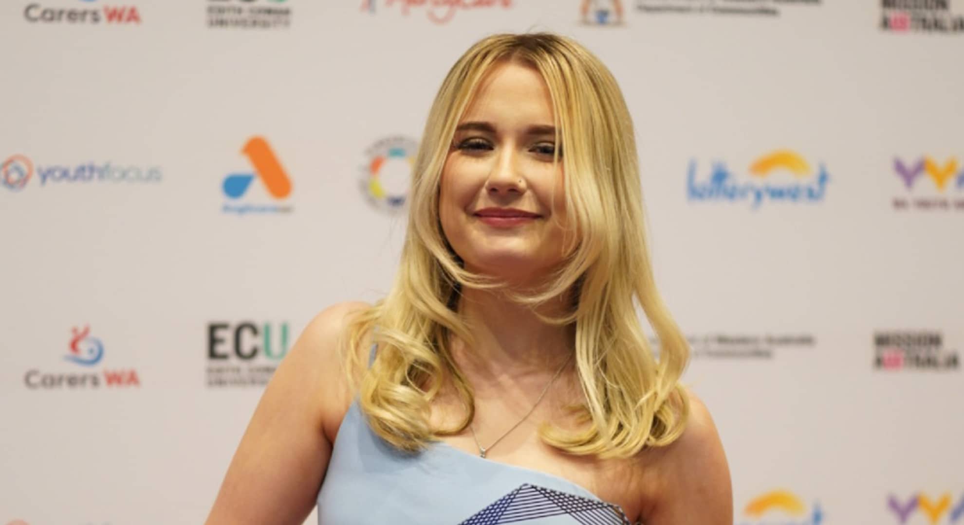 Young woman with an award