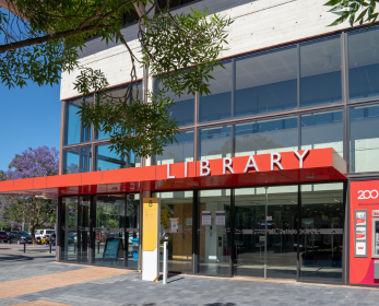 Exterior of the Mount Lawley Campus Library building, showing the main entrance and library signage.