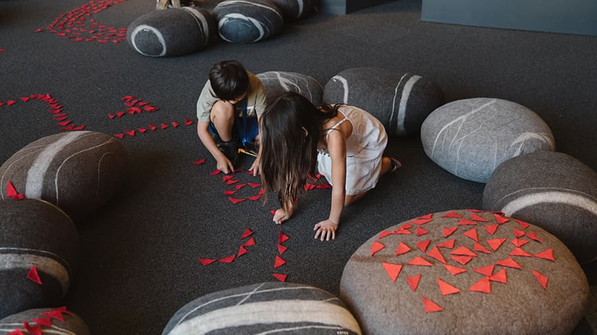 Image of children interacting with the exhibition.