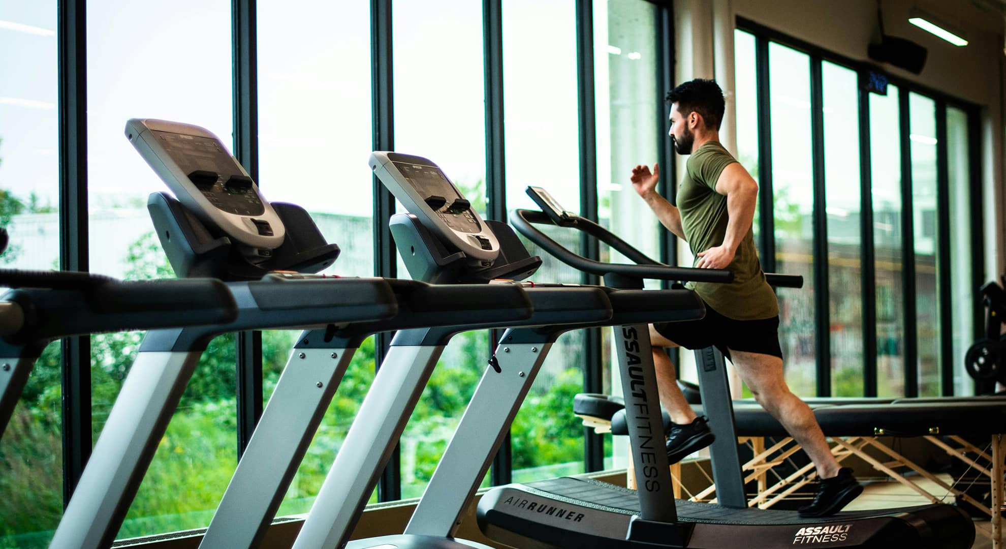 Man running on a treadmill.