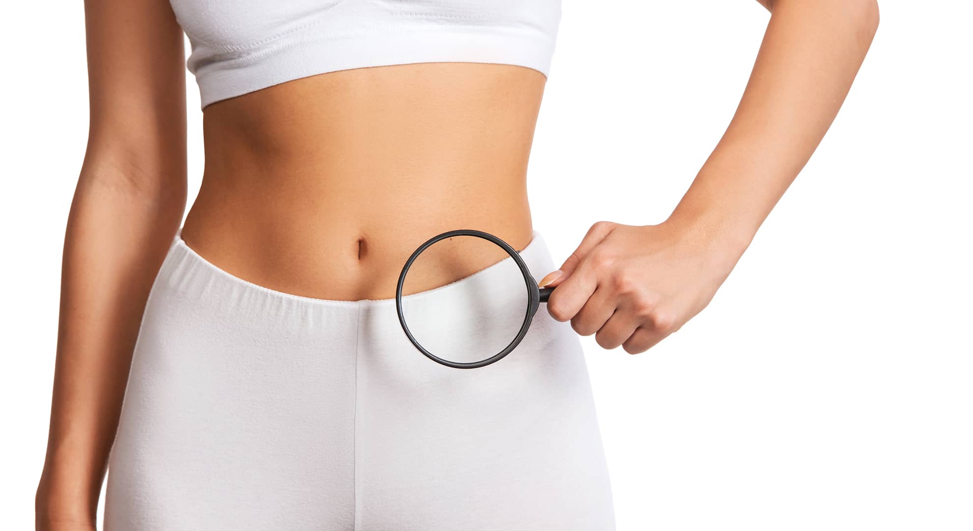 Woman in white fitness clothing holding a magnifying glass at her waist