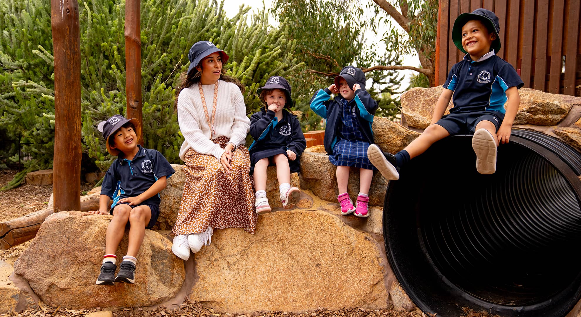 Young female teacher with students