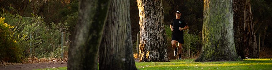 Paolo running through trees