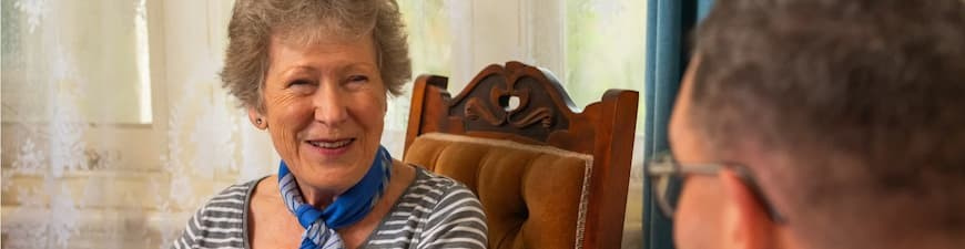 A woman talking to an ECU team member