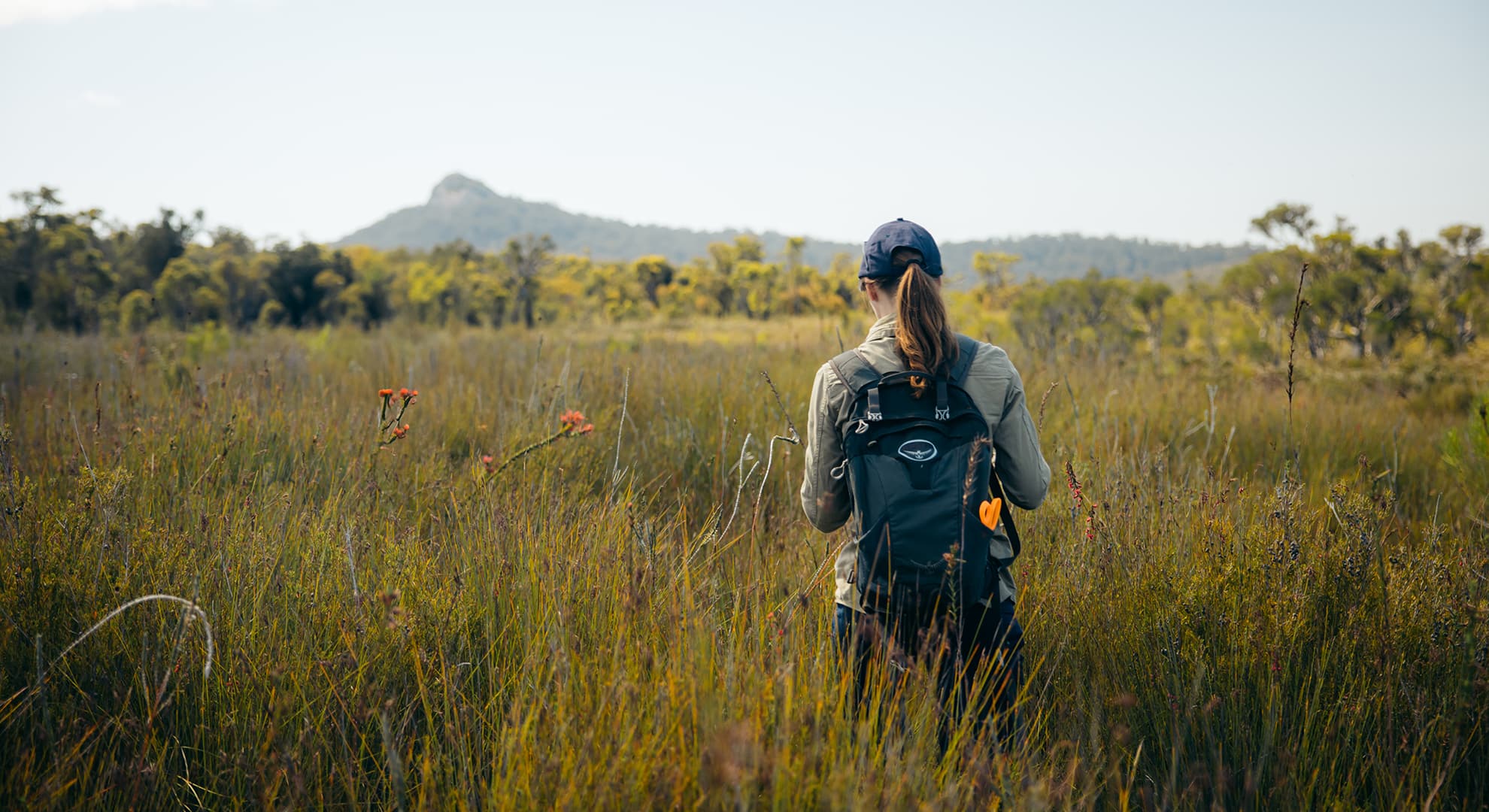 Woman walking in peatland.