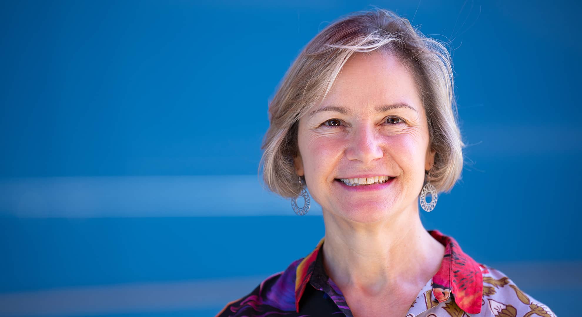 Close up of a woman smiling at the camera