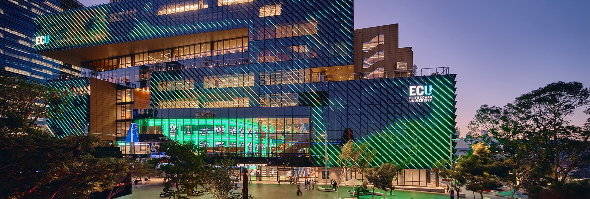 The new ECU City Campus lit up at dusk